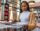 young woman shopping for records